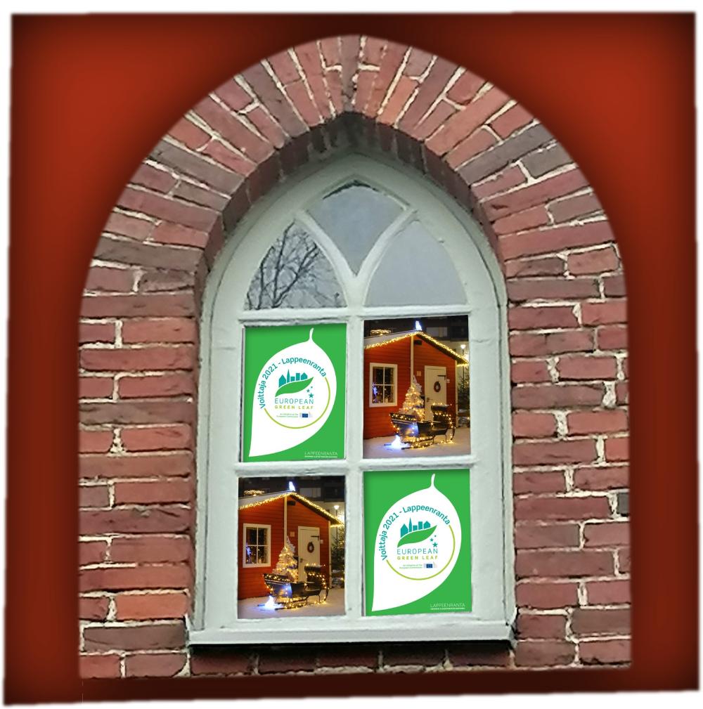 Green Leaf logot ja jouluiset kuvat kellotapulin ikkunassa